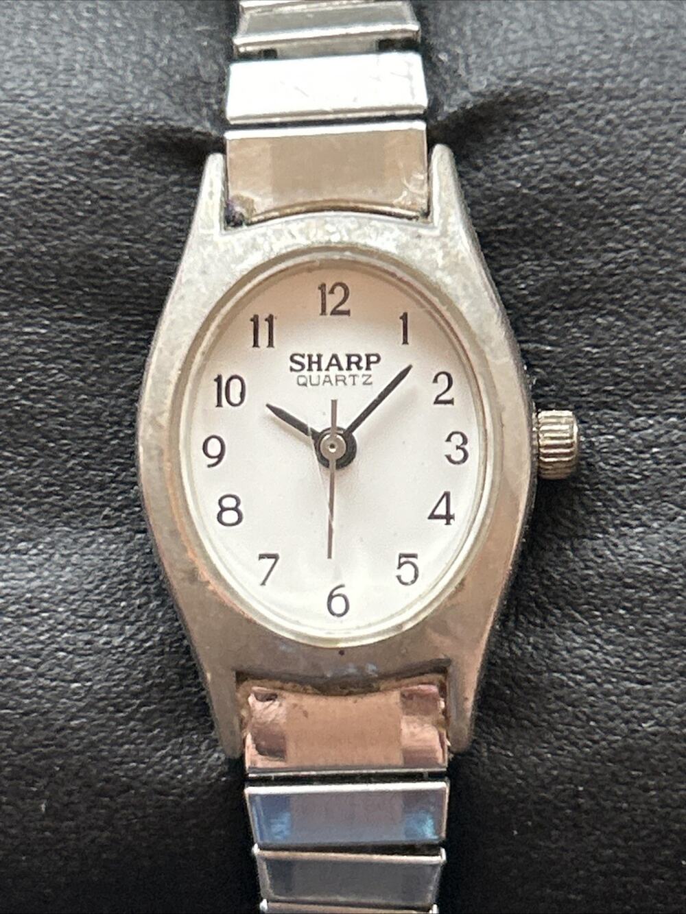 Sharp Silver Tone White Dial Stretch Band Women’s Quartz Watch